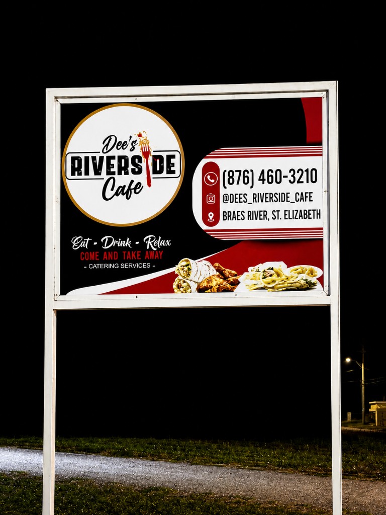 Dee's Riverside Cafe sign in Braes River, St Elizabeth, Jamaica